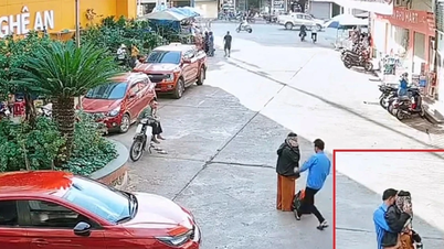 Bất ngờ trước pha xử lý của anh bảo vệ với người phụ nữ đứng nghe điện thoại giữa đường