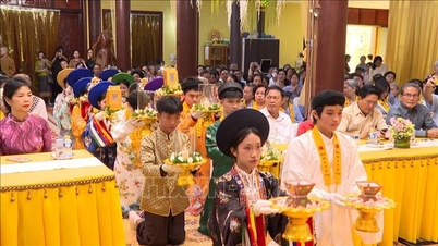 Celebrating the principle of remembering one's roots and honoring Vietnamese cultural identity in Laos.