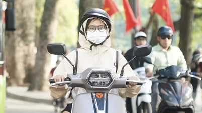 Det er kjølig i Hanoi tidlig om morgenen, og folk tar på seg varme jakker når de går ut.