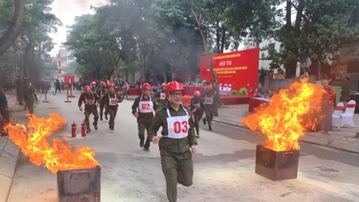 Khuong Dinh: Organiserar en brandbekämpningstävling för civilförsvarsstyrkan.